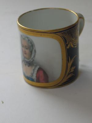 Appraisal: A PARIS PORCELAIN CUP th century the straight sides painted