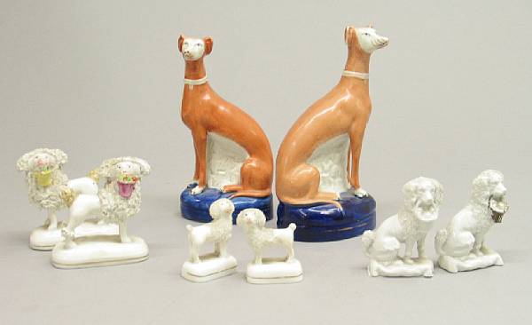 Appraisal: A group of Staffordshire ceramic dogs second half th century