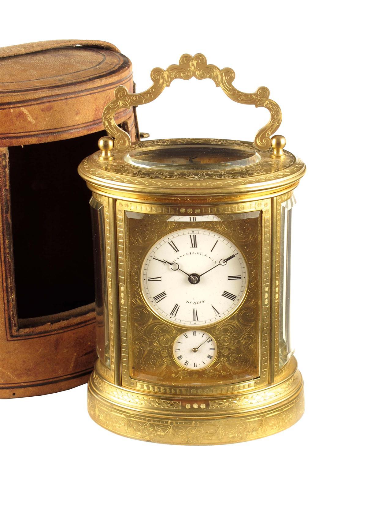 Appraisal: A good engraved oval striking carriage clock with alarum