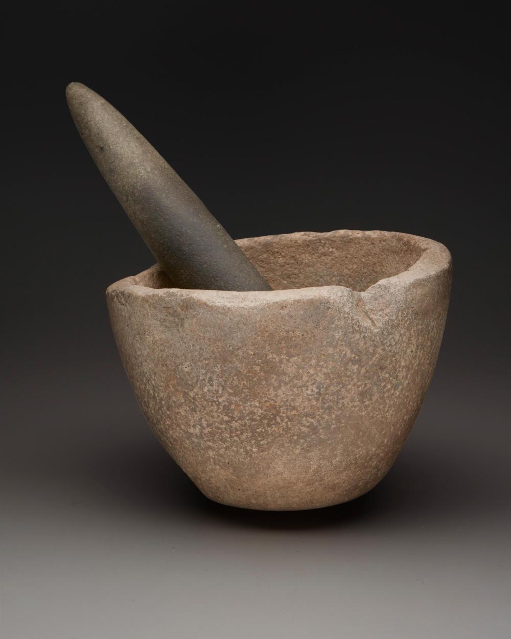 Appraisal: A California mortar and pestle Pre-historic or later A large