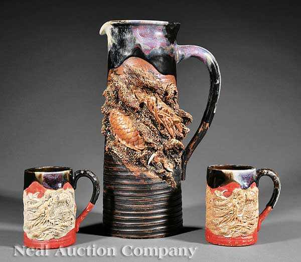 Appraisal: A Japanese Sumida Ware Dragon Motif Pitcher with Two Mugs