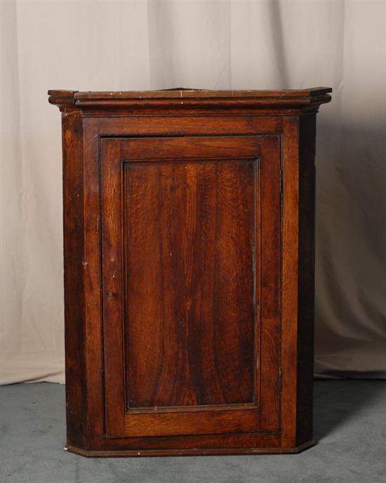 Appraisal: A th C English Oak Wall-hung Corner Cabinet with a