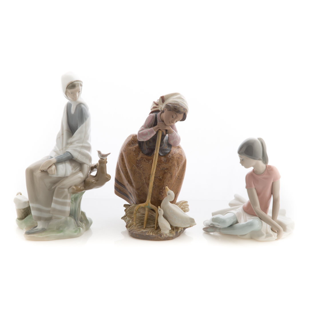 Appraisal: Three Lladro porcelain figures including New Shepherdess in H Seated