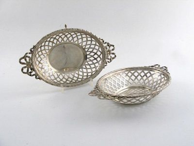 Appraisal: A pair of modern pierced bon bon dishes woven border