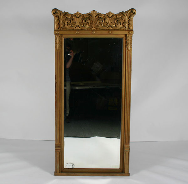 Appraisal: Gilt pier mirror with beveled glass carved floral crown and