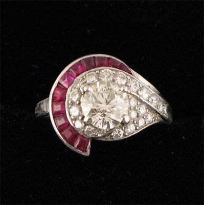 Appraisal: A diamond and ruby ring by Raymond Yard the circular