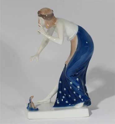 Appraisal: A Rosenthal porcelain figure of a snake charming woman glazed