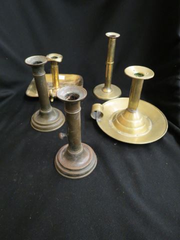 Appraisal: Early Brass Candlesticks chamberstick style with raising slide tallest is