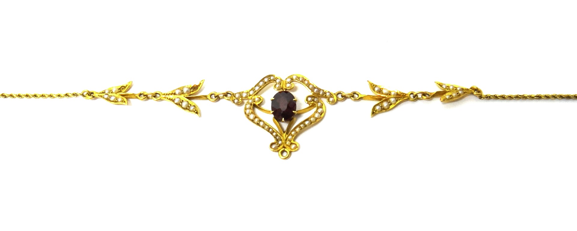 Appraisal: A gold garnet and seed pearl set necklace the front