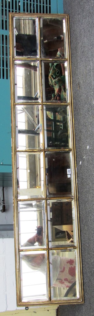 Appraisal: A th century gilt framed wall mirror with two rows