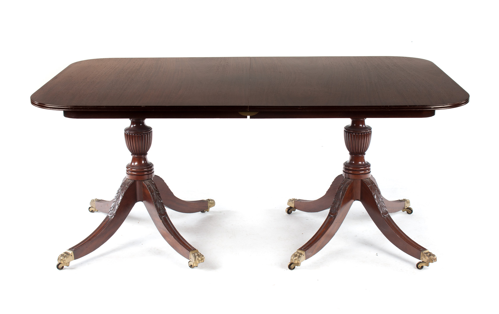 Appraisal: George III style carved mahogany dining table two in D-shaped