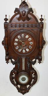 Appraisal: French Renaissance clock in walnut with barometer th century h