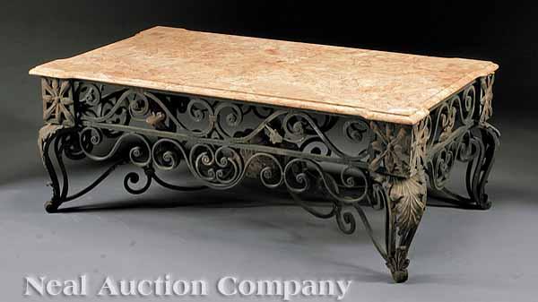 Appraisal: A Decorative Wrought Iron Low Table variegated travertine marble top