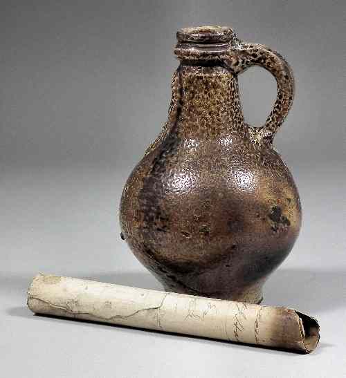 Appraisal: A th Century Northern European saltware glazed stoneware ''Bellarmine'' jug