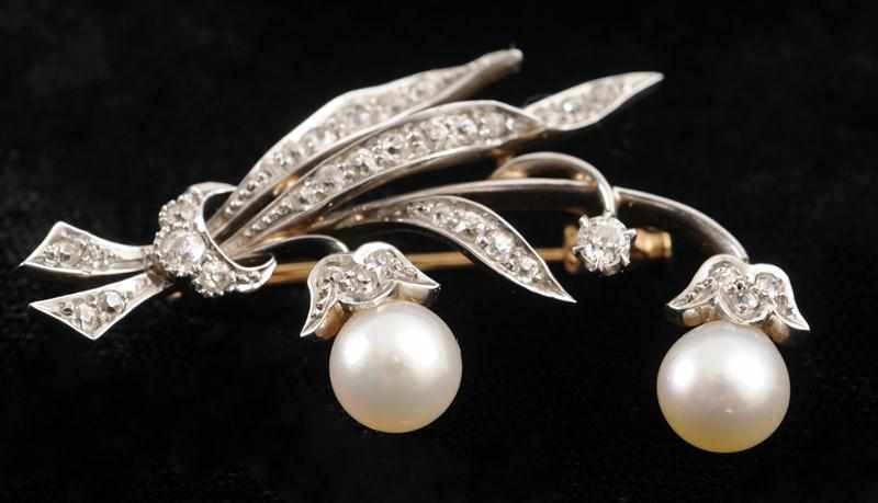 Appraisal: GOLD DIAMOND AND PEARL BROOCH In the form of a