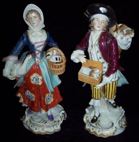 Appraisal: A pair of late th Century Continental figures rabbit seller