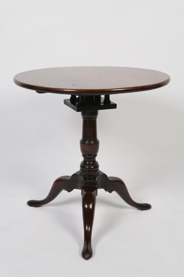 Appraisal: A GEORGE III MAHOGANY TRIPOD TABLE the circular top on