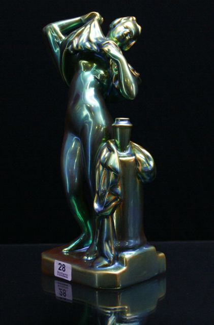 Appraisal: A Zsolnay figure of a standing nude circa in typical