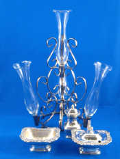 Appraisal: A four vase silver plated epergne ht cm and a