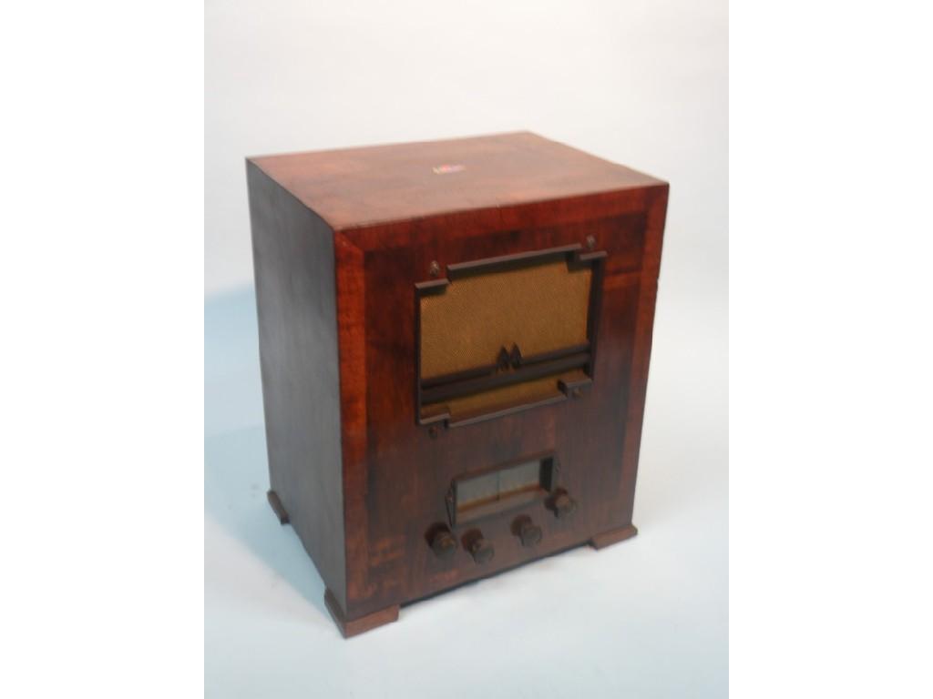 Appraisal: A Marconi Art Deco style radio in crossbanded walnut case