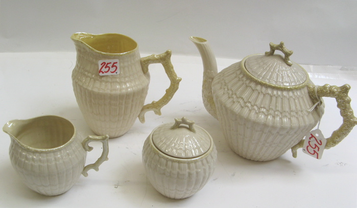 Appraisal: IRISH BELLEEK PIECE PORCELAIN TEASET Limpet pattern yellow st green