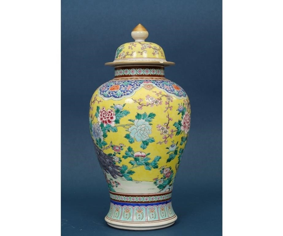 Appraisal: Colorful lidded Asian temple jar th c decorated with bird