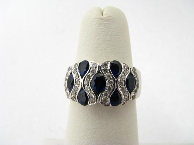 Appraisal: K white gold diamond and blue sapphire ring size