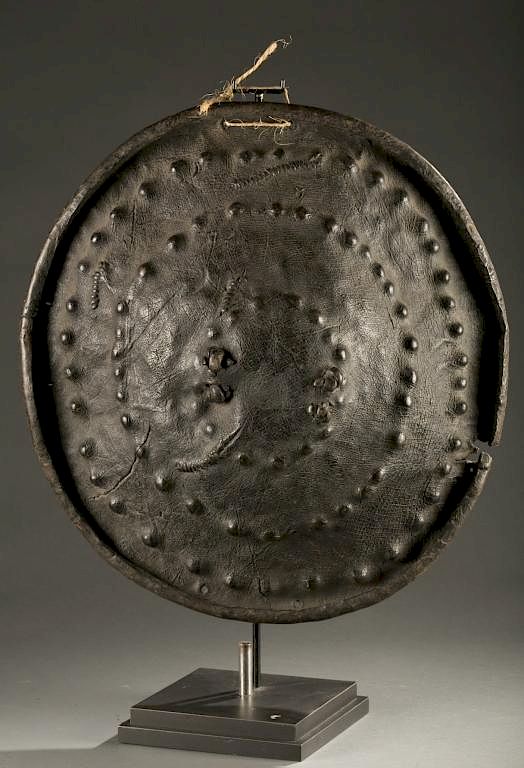 Appraisal: Ethipian hide shield th th c A rhino or elephant