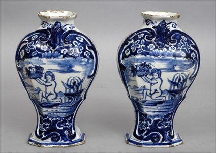 Appraisal: PAIR OF DUTCH DELFT BLUE AND WHITE ANGULAR BALUSTER-FORM GARNITURE