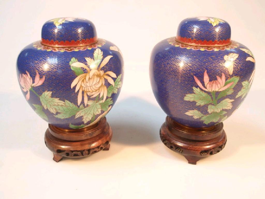 Appraisal: A pair of modern Chinese cloisonn jars and covers on