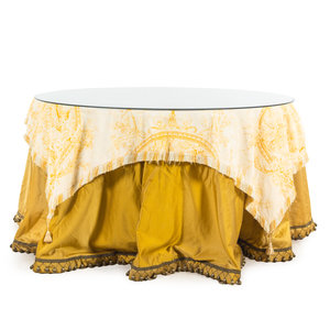 Appraisal: A Glass-Topped Silk Skirted Dining Table with a Fortuny Cover