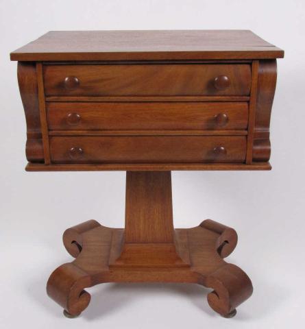 Appraisal: Empire style three-drawer stand table light mahogany finish square column