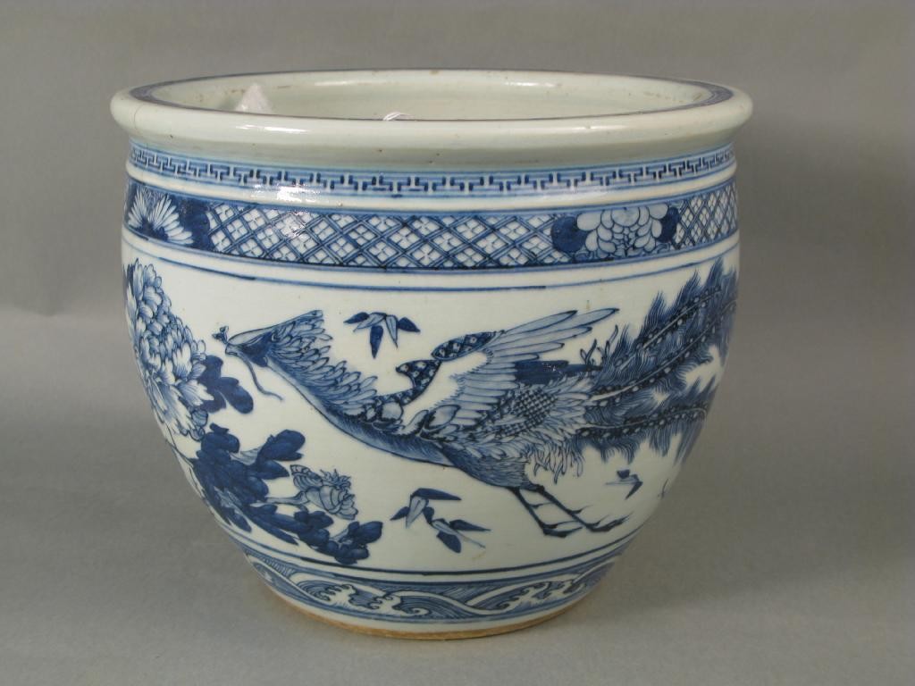 Appraisal: A Chinese porcelain jardiniere painted with exotic birds and plants