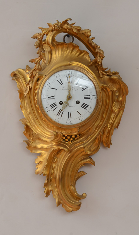 Appraisal: LOUIS XV STYLE GILT-BRONZE CARTEL CLOCK The in enamel dial