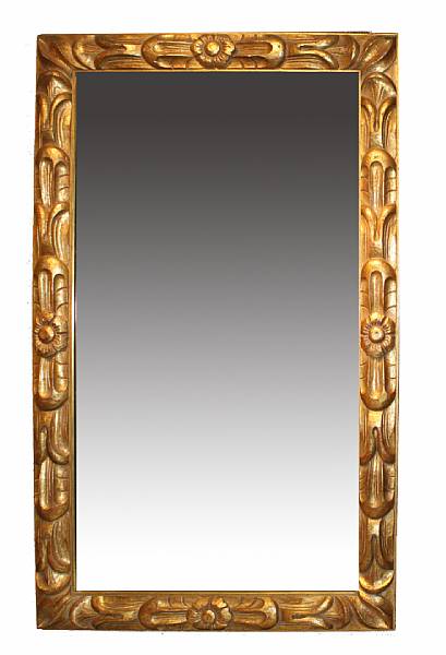 Appraisal: A carved giltwood mirror height in width