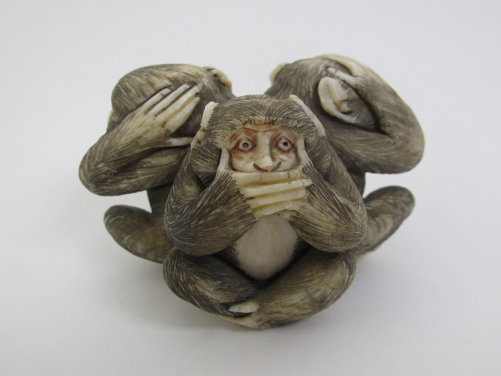 Appraisal: A Japanese carving of the three monkeys seated back to