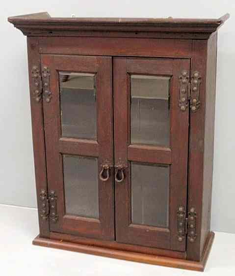 Appraisal: English oak hanging cupboard th c with two beveled glass