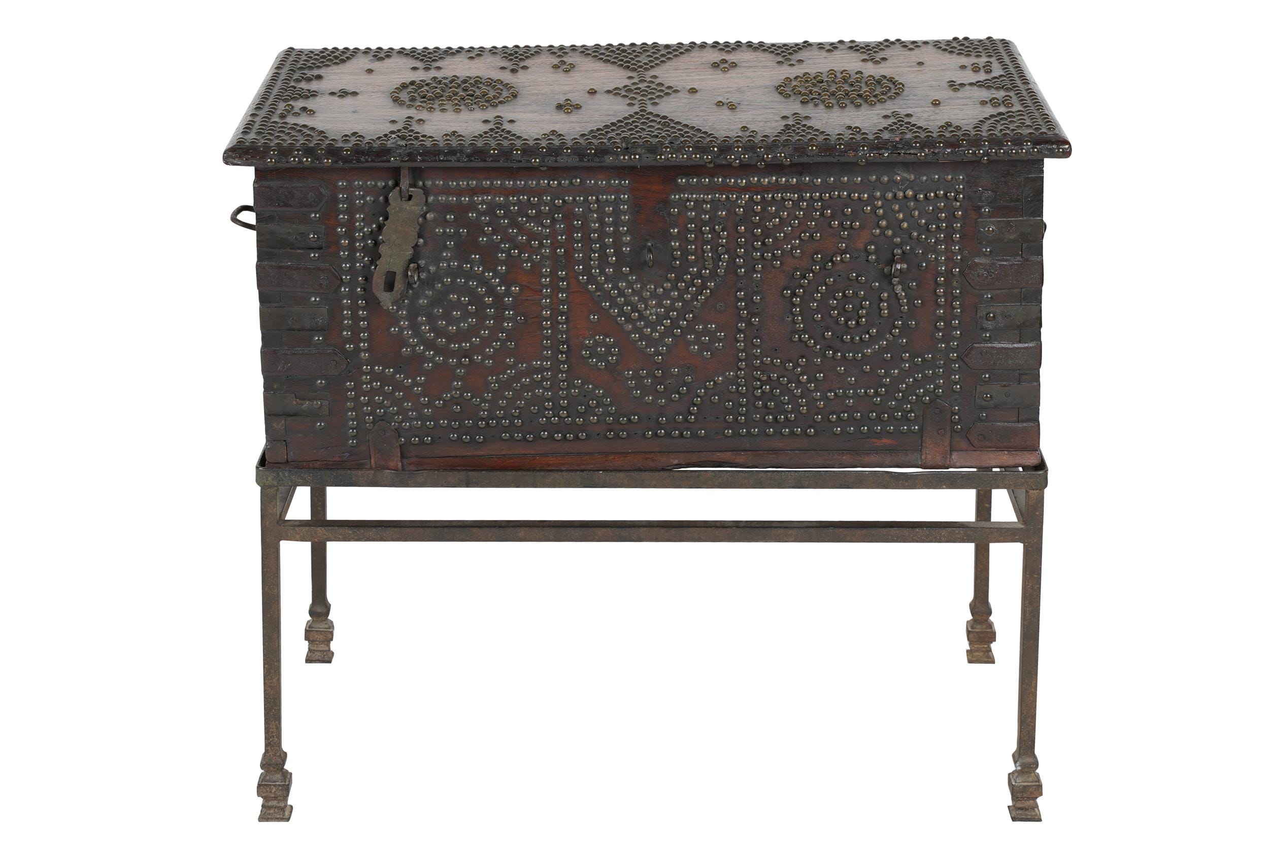 Appraisal: METAL-STUDDED WOOD TRUNK ON IRON STAND Condition missing one iron