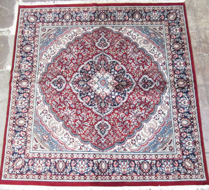 Appraisal: HAND KNOTTED ORIENTAL AREA RUG Indo-Persian floral and central floral