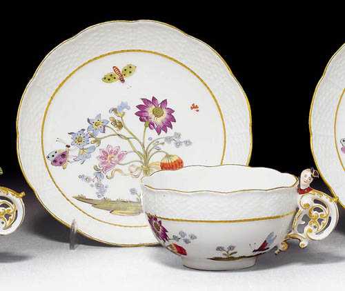 Appraisal: CUP AND SAUCER WITH 'BIENENMUSTER' Meissen circa Rococo handle heightened