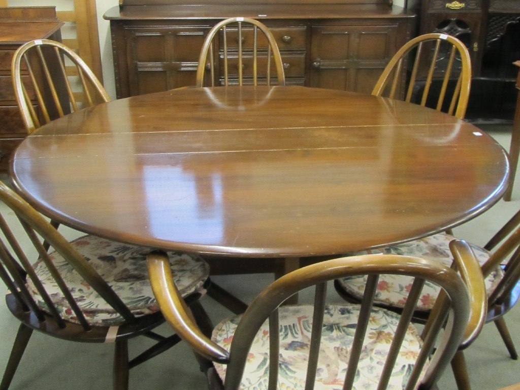 Appraisal: Ercol dresser six chairs and drop leaf dining table