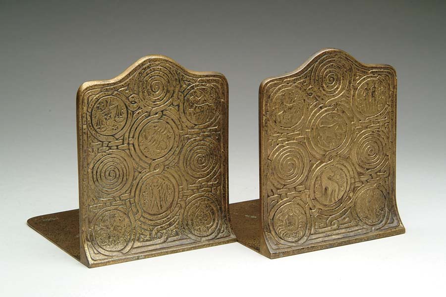 Appraisal: TIFFANY ZODIAC BOOKENDS Nice Tiffany bookends have zodiac designs within