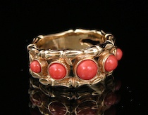 Appraisal: A Stephen Dweck k Coral Ring Five graduated coral beads