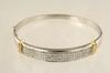 Appraisal: BRACELET - K white and yellow gold hinged bangle bracelet