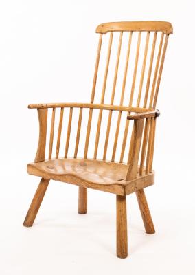 Appraisal: A rustic stick back chair with a solid elm seat