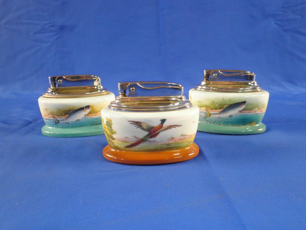 Appraisal: Two Minton ceramic and chrome plated lighters decorated with a