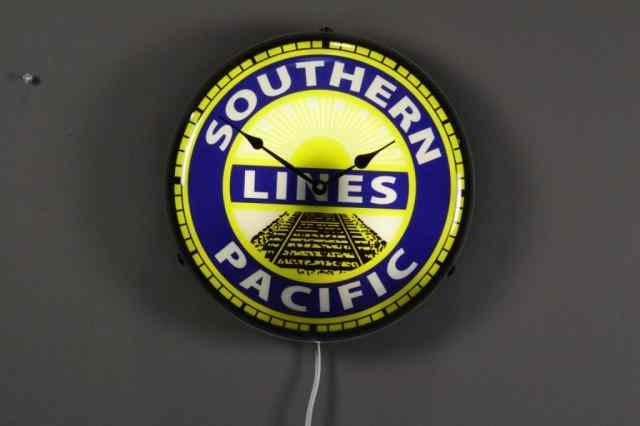 Appraisal: SOUTHERN PACIFIC LINES WALL CLOCKSouthern Pacific Lines electric wall clock