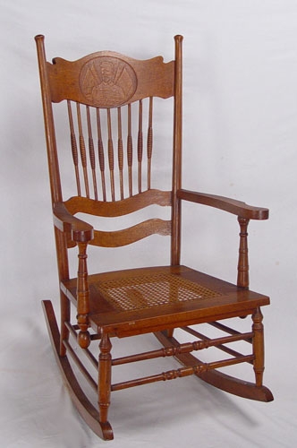 Appraisal: PRESSBACK ROCKING CHAIR WITH SPANISH AMERICAN WAR HERO ADMIRAL SAMPSON