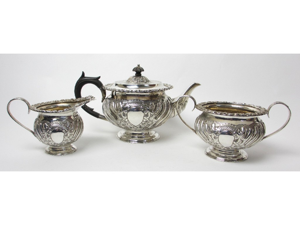 Appraisal: A late Victorian three piece silver tea service of squat