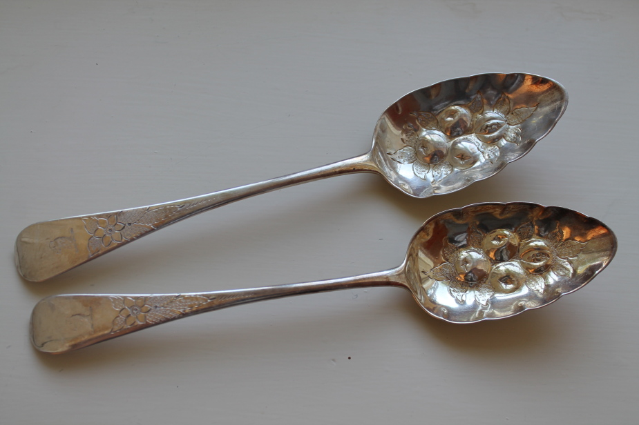 Appraisal: A pair of George III serving spoons with later embossed